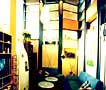 jp3 - hybridhaus - wohnhalle mit ofen und sofa